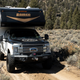 Image for article titled A Ford F-350 With Huge Tires And A Lance 855S Camper Makes A Comfy Portable Home